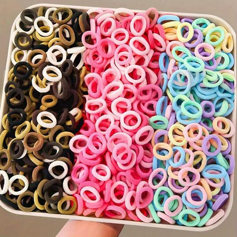 10/$1.45 Baby Hair Ties- MULTI COLORED